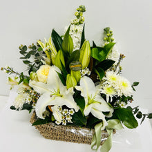 A white lilies and white flowers mixed with green foliage in a floral arrangement delivered brisbane, brendale florist delivery, brendale white flower delivery, brendale sympathy flowers delivered, eatons hill white flowers, albany creek sympathy white flowers delivered, flower delivery to pinaroo, white flowers to albany creek remorial flower delivery, cashmere sympathy flowers, warner sympathy flower delivery, strathpine sympathy flower delivery, bald hills flower delivery