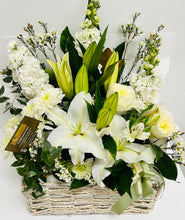 A white lilies and white flowers mixed with green foliage in a floral arrangement delivered brisbane, brendale florist delivery, brendale white flower delivery, brendale sympathy flowers delivered, eatons hill white flowers, albany creek sympathy white flowers delivered, flower delivery to pinaroo, white flowers to albany creek remorial flower delivery, cashmere sympathy flowers, warner sympathy flower delivery, strathpine sympathy flower delivery, bald hills flower delivery