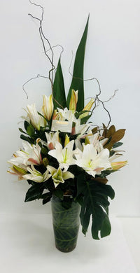 Modern Vase of lillies and modern foliages from