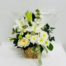 A white lilies and white flowers mixed with green foliage in a floral arrangement delivered brisbane, brendale florist delivery, brendale white flower delivery, brendale sympathy flowers delivered, eatons hill white flowers, albany creek sympathy white flowers delivered, flower delivery to pinaroo, white flowers to albany creek remorial flower delivery, cashmere sympathy flowers, warner sympathy flower delivery, strathpine sympathy flower delivery, bald hills flower delivery